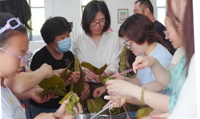 【凌霄新闻台】浓情端午粽飘香，同心同乐暖校园 ——宝带实验小学开展教职工端午包粽子主题活动